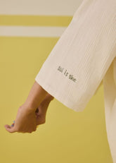 A Model Wearing Multicolor Organic Cotton She Is Sunshine Organic Cotton Top , curated by Only Ethikal